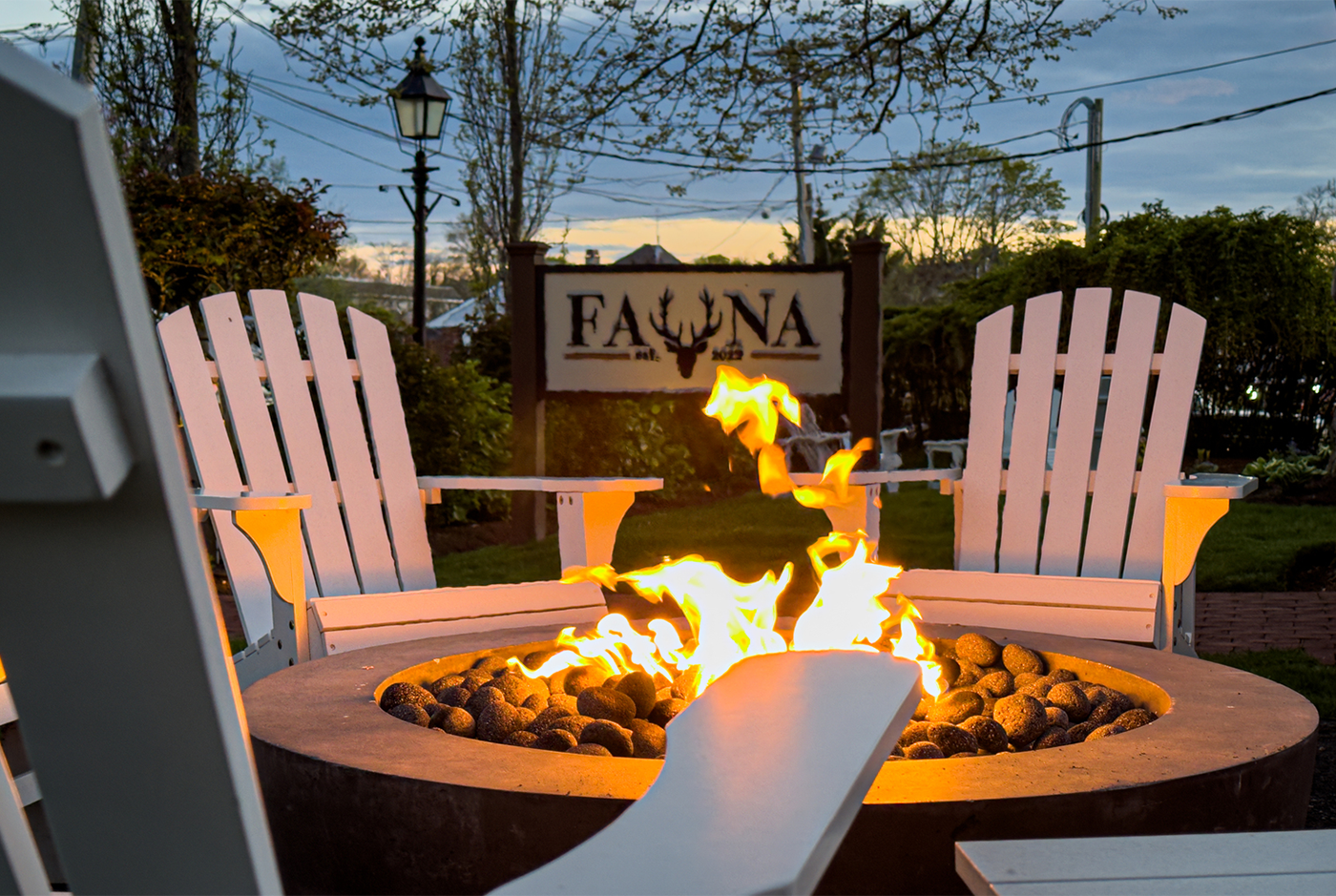 A firepit in the evening at Fauna a restaurant in the Hamptons